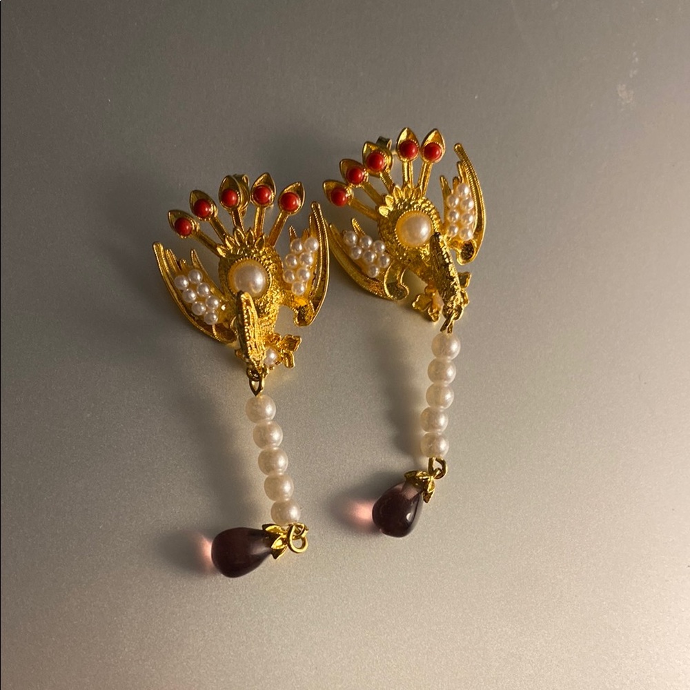 Gold Phoenix earring with elegant design